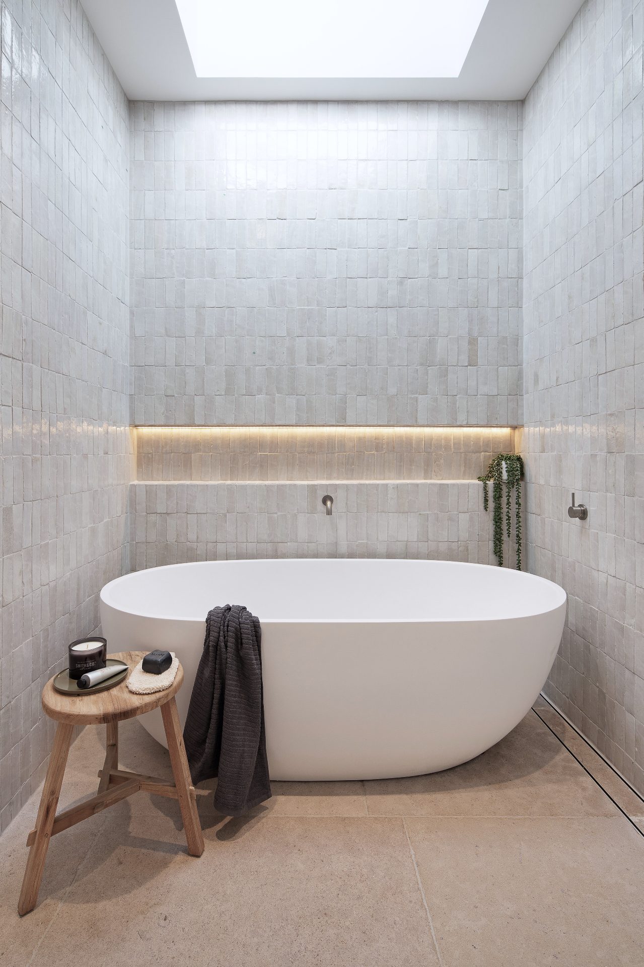 Ensuite with freestanding bath, skylight and handmade tiles